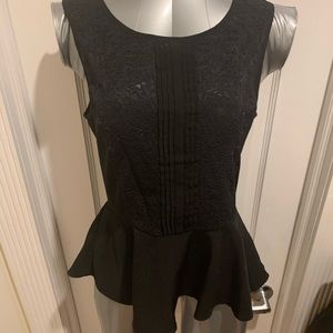 Adorable women’s peplum top with lace detail